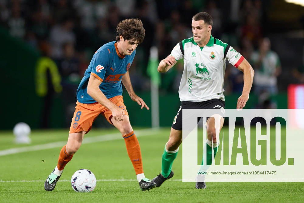 Javi Guerra of Valencia CF competes for the ball with Alvaro Mantilla of Real Racing Club de Santander during the LaLiga EA Sports match between Real Racing Club de Santander and Valencia CF at Campos de de El Sardinero on October 11, 2026, in Santander, Spain. Santander Spain - ZUMAa181 20261011_zaa_a181_370