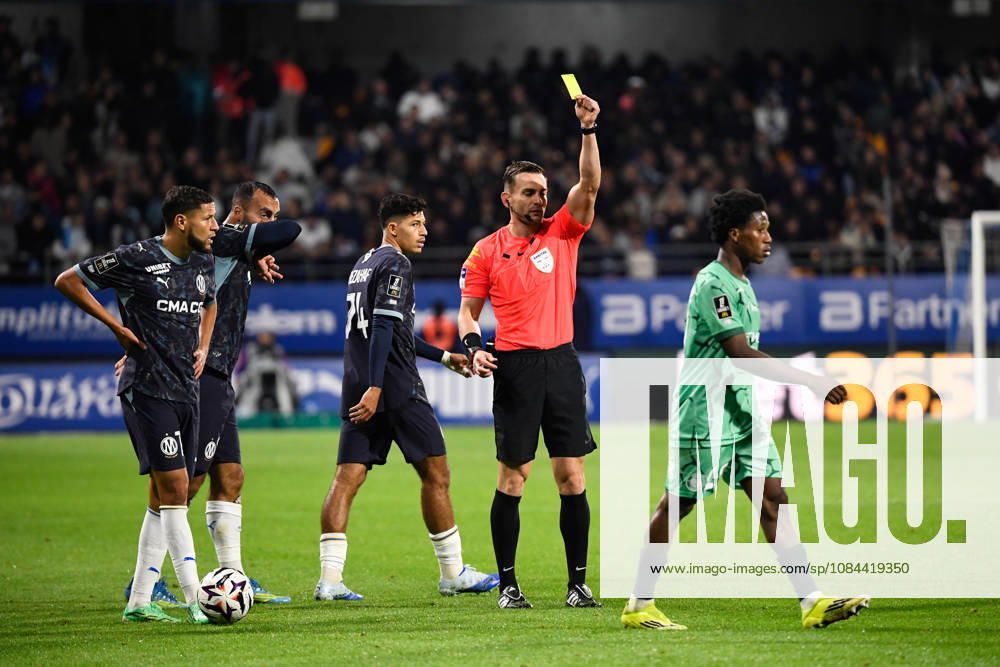 ESTAC Troyes v Olympique de Marseille - Ligue 1 McDonald s 2026 2027 Karim DERMANE of Troyes , Kelyann BEZAHAF of Olympique de Marseille , Amine HARIT of Marseille Guillaume Paradis referee during Ligue 1 McDonald s match between Troyes and Marseille at Stade de l Aube on October 11, 2026 in Troyes, France. Troyes France