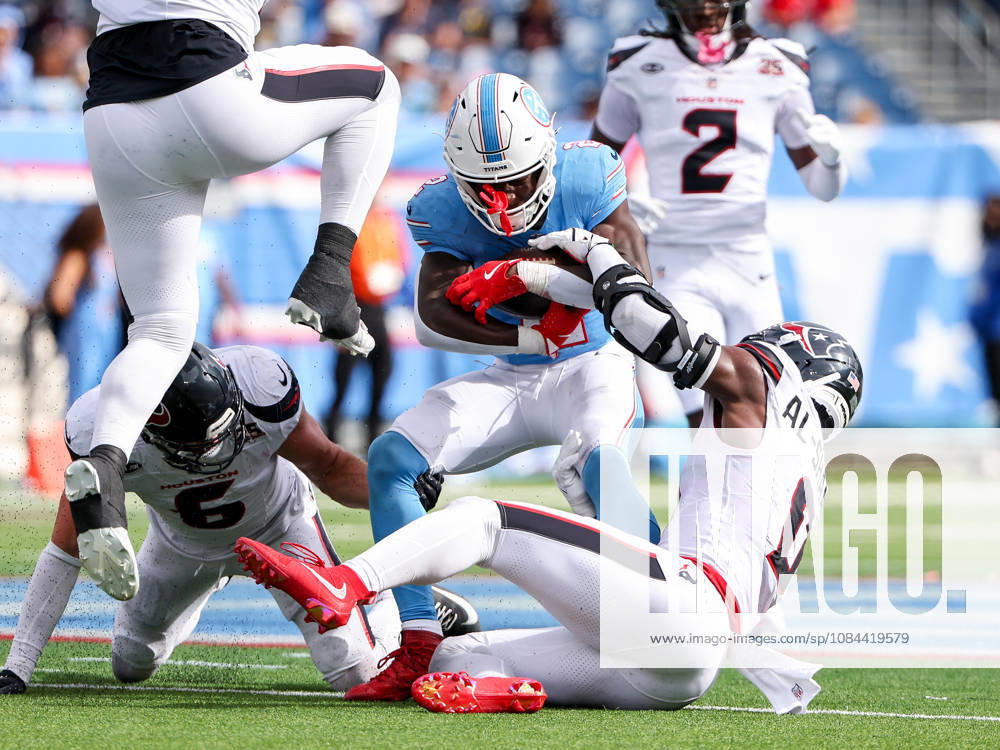 Oct 11, 2026; Nashville, TN, USA; Tennessee Titans running back Tyjae Spears (2) is tackled by Houston Texans linebacker Azeez al-Shaair (0) during the NFL, American Football Herren, USA regular season game between the Houston Texans and Tennessee Titans at Nissan Stadium. Mandatory Credit: -Cal Media Nashville USA - ZUMAc04_ 20261011_zma_c04_076