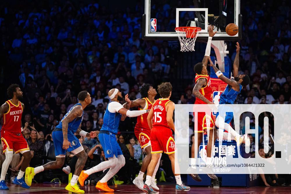 (261011) -- MACAO, Oct. 11, 2026 -- Kyrie Irving (1st R) of Dallas Mavericks shoots during the 2026-2027 NBA, Basketball Herren, USA preseason game between Dallas Mavericks and Houston Rockets in Macao, south China, on Oct. 11, 2026. ) (SP)CHINA-MACAO-BASKETBALL-NBA PRESEASON-ROCKETS VS MAVERICKS (CN) CheongxKamxKa