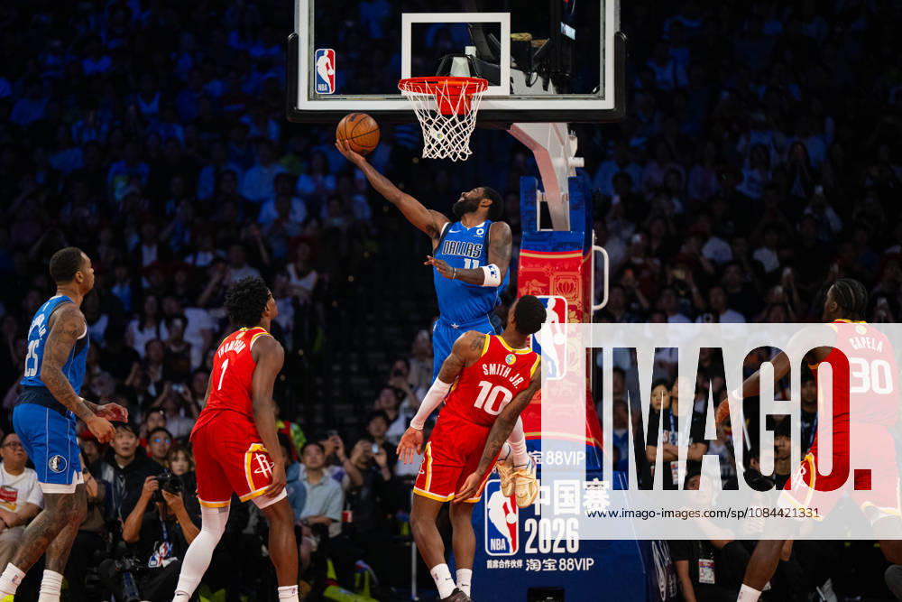 (261011) -- MACAO, Oct. 11, 2026 -- Kyrie Irving (top) of Dallas Mavericks goes for a layup during the 2026-2027 NBA, Basketball Herren, USA preseason game between Dallas Mavericks and Houston Rockets in Macao, south China, on Oct. 11, 2026. ) (SP)CHINA-MACAO-BASKETBALL-NBA PRESEASON-ROCKETS VS MAVERICKS (CN) CheongxKamxKa