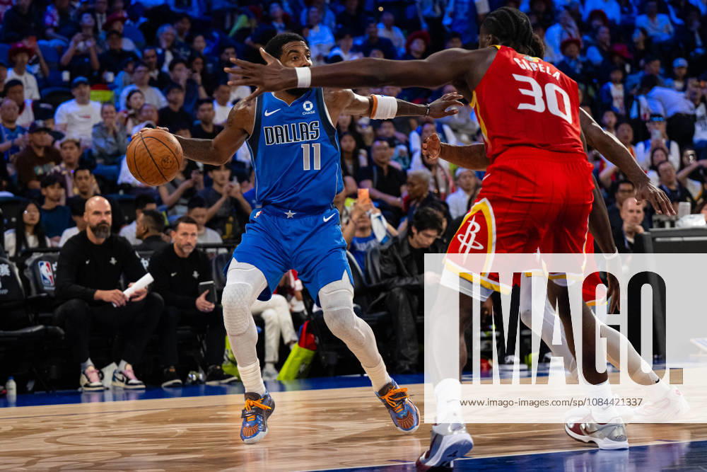 (261011) -- MACAO, Oct. 11, 2026 -- Kyrie Irving (L) of Dallas Mavericks dribbles during the 2026-2027 NBA, Basketball Herren, USA preseason game between Dallas Mavericks and Houston Rockets in Macao, south China, on Oct. 11, 2026. ) (SP)CHINA-MACAO-BASKETBALL-NBA PRESEASON-ROCKETS VS MAVERICKS (CN) CheongxKamxKa