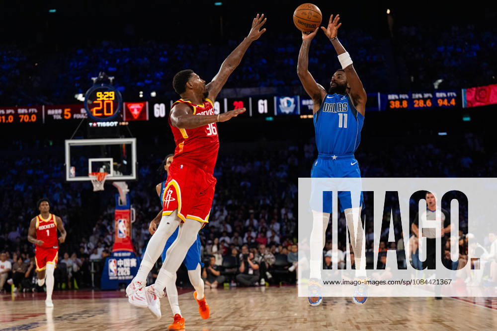 (261011) -- MACAO, Oct. 11, 2026 -- Kyrie Irving (R) of Dallas Mavericks shoots during the 2026-2027 NBA, Basketball Herren, USA preseason game between Dallas Mavericks and Houston Rockets in Macao, south China, on Oct. 11, 2026. ) (SP)CHINA-MACAO-BASKETBALL-NBA PRESEASON-ROCKETS VS MAVERICKS (CN) CheongxKamxKa