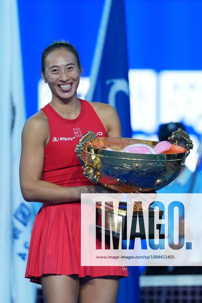 (261011) -- BEIJING, Oct. 11, 2026 -- Zheng Qinwen poses with the trophy during the awarding ceremony after the women s singles final between Zheng Qinwen of China and Mirra Andreeva of Russia at 2026 China Open tennis tournament in Beijing, China, Oct. 11, 2026. ) (SP)CHINA-BEIJING-TENNIS-CHINA OPEN-WOMEN S SINGLES-FINAL (CN) SunxFei