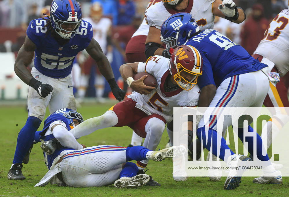 Washington Commanders QB 5 Jayden Daniels is sacked by New York Giants DB 22 Andru Phillips during the Washington Commanders game against the New York Giants at Northwest Stadium in Landover, MD. CSM Landover United States of America - ZUMAc04_ 20261011_zma_c04_119