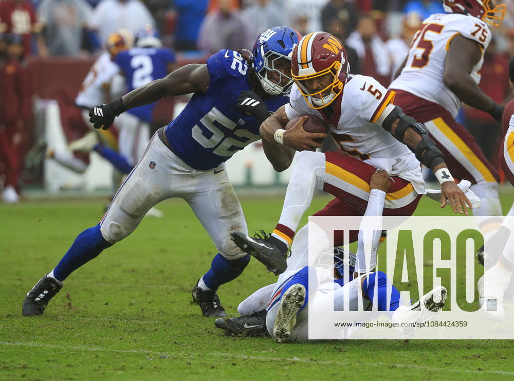 Washington Commanders QB 5 Jayden Daniels is sacked by New York Giants DB 22 Andru Phillips during the Washington Commanders game against the New York Giants at Northwest Stadium in Landover, MD. CSM Landover United States of America - ZUMAc04_ 20261011_zma_c04_100