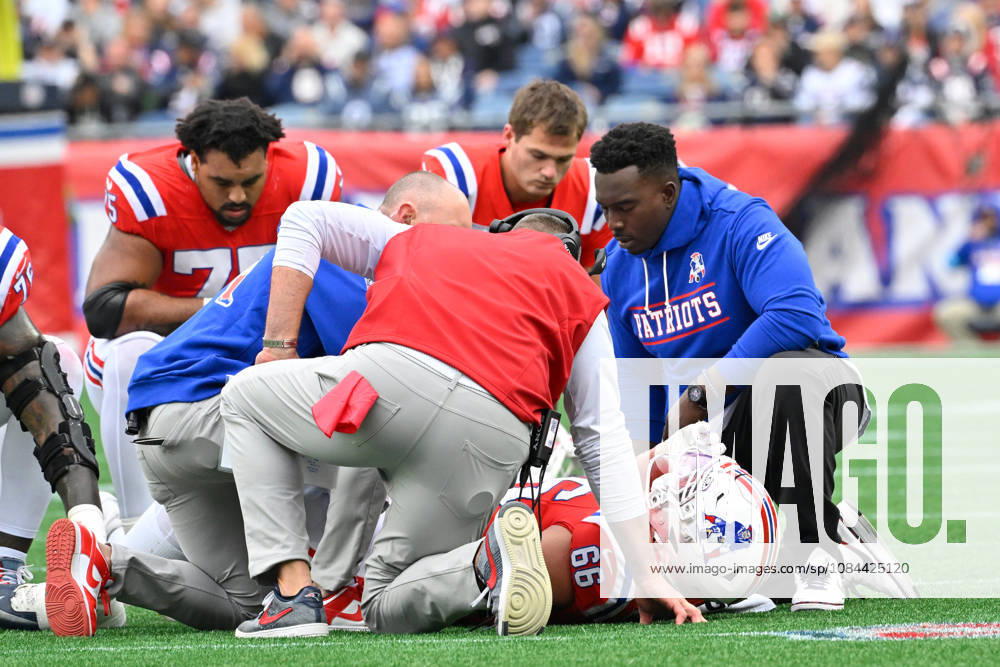 Oct 11, 2026; Foxborough, MA, USA; New England Patriots offensive tackle Will Campbell (66) is checked by training staff and head coach Mike Vrabel (red vest) during the first half against the Las Vegas Raiders at Gillette Stadium. Mandatory Credit: -Cal Media NFL, American Football Herren, USA 2026: Raiders Vs Patriots OCT 11 - ZUMAc04_ 20261011_zma_c04_142