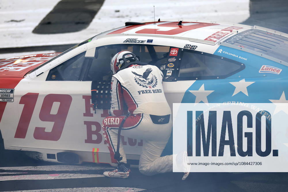 CHARLOTTE, NC - OCTOBER 11: Chase Briscoe ( 19 Joe Gibbs Racing Freebird Spring Water Toyota) reflects after winning the NASCAR, Motorsport, USA Cup Series Playoffs Bank of America 400 race on October 11, 2026 at Charlotte Motor Speedway in Charlotte, NC. (Photo by Jeff Robinson Icon Sportswire) AUTO: OCT 11 NASCAR Cup Series Playoffs Bank of America 400 Icon261011639400