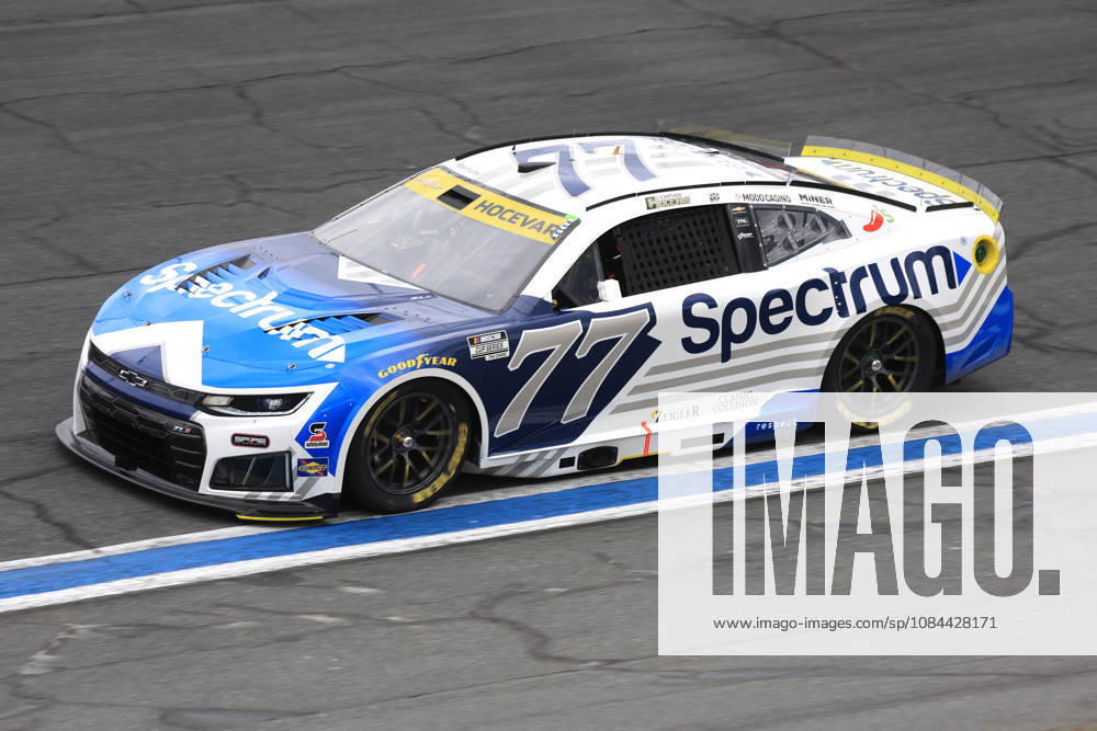 CHARLOTTE, NC - OCTOBER 11: Carson Hocevar ( 77 Spire Motorsports Spectrum Chevrolet) races into turn 3 during the running of the NASCAR, Motorsport, USA Cup Series Playoffs Bank of America 400 race on October 11, 2026 at Charlotte Motor Speedway in Charlotte, NC. (Photo by Jeff Robinson Icon Sportswire) AUTO: OCT 11 NASCAR Cup Series Playoffs Bank of America 400 Icon26101112930400