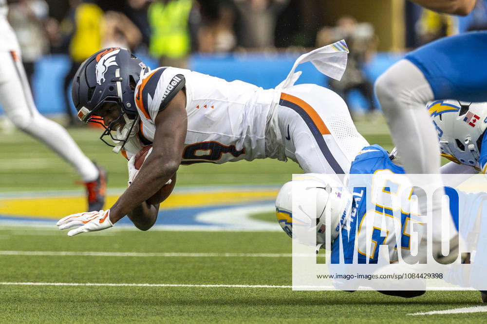 Denver Broncos Wide Receiver Marvin Mims Jr. (19) is brought down by Los Angeles Chargers running back Kimani Vidal (28) during an NFL, American Football Herren, USA football game, in Inglewood, Calif. on Sunday Oct. 11, 2026. Inglewood USA - ZUMAc68_ 20261011_zaf_c68_025