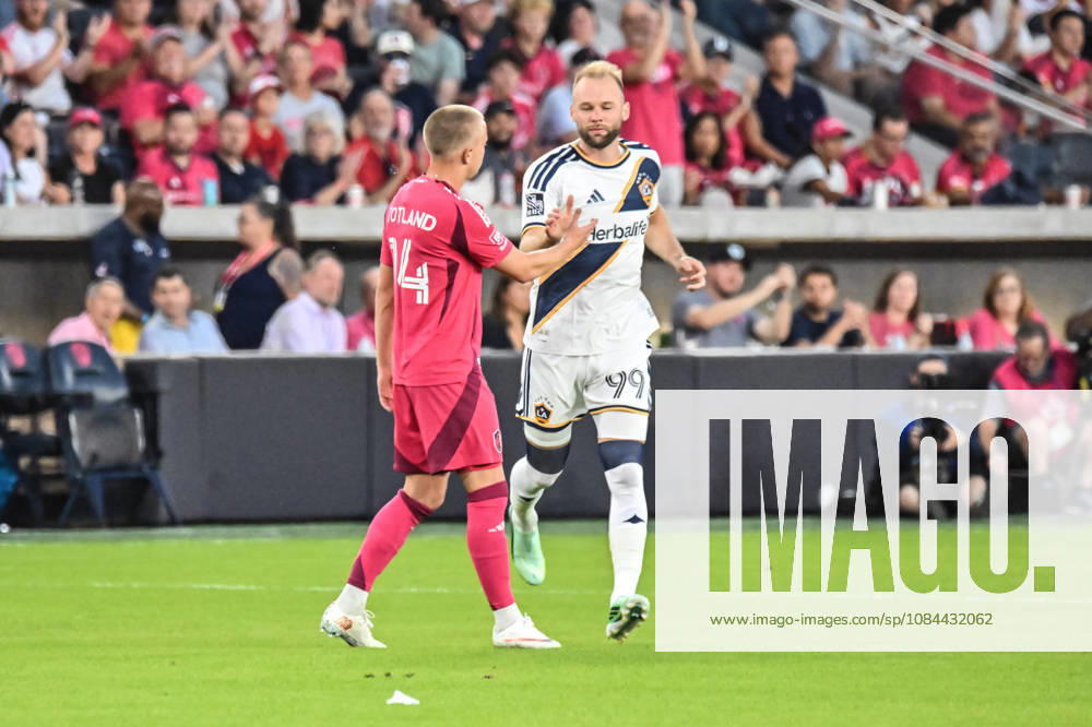 ST. LOUIS, MO - OCTOBER 11: Tomas Totland (14) of the St. Louis CITY SC greets former teammate Joao Klauss (99) of the LA Galaxy as he enters the game during the MLS, Fussball Herren, USA regular season match where St. Louis CITY SC hosted LA Galaxy on Sunday October 11th, 2026, at Energizer Park in St. Louis City, MO. (Photo by Rick Ulreich Icon Sportswire) SOCCER: OCT 11 MLS St. Louis CITY SC vs LA Galaxy Icon26101123