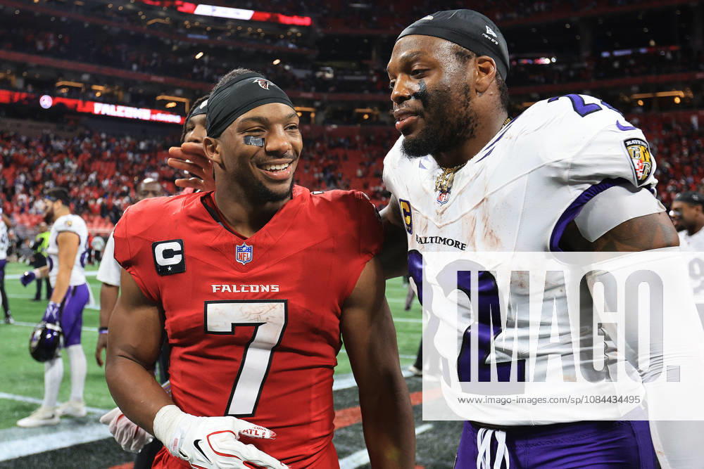 ATLANTA, GA - OCTOBER 11: Bijan Robinson (7) of the Atlanta Falcons and Derrick Henry (22) of the Baltimore Ravens share a laugh after the Sunday evening NFL, American Football Herren, USA game between the Atlanta Falcons and the Baltimore Ravens on October 11, 2026 at the Mercedes-Benz Stadium in Atlanta, Georgia. (Photo by David J. Griffin Icon Sportswire) NFL: OCT 11 Ravens at Falcons Icon9532610111310