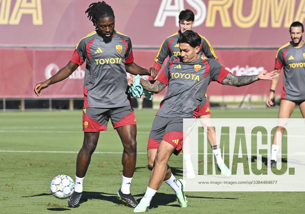IPA89639264 - Manu Kone of Roma and Nahuel Molina of Roma during a training session ahead of the UEFA Champions League soccer match between AS Roma and Real Madrid, as well as the press conference, PK, Pressekonferenz and training at the Trigoria Training Center on October 13, 2026, in Rome, Italy. During the AS Roma press conference for the UEFA Champions League soccer match in Rome, Italy, on October 13, 2026