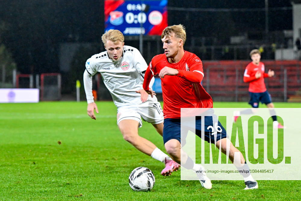 V.li.: Maximilian Seemueller (Landsberg, 11) Andy Breuer (Unterhaching, 26) im Zweikampf, Duell, duel, tackle, Dynamik, Action, Aktion, 13.10.2026, Unterhaching (Deutschland), Fussball, Regionalliga Bayern, SpVgg Unterhaching - TSV 1882 Landsberg