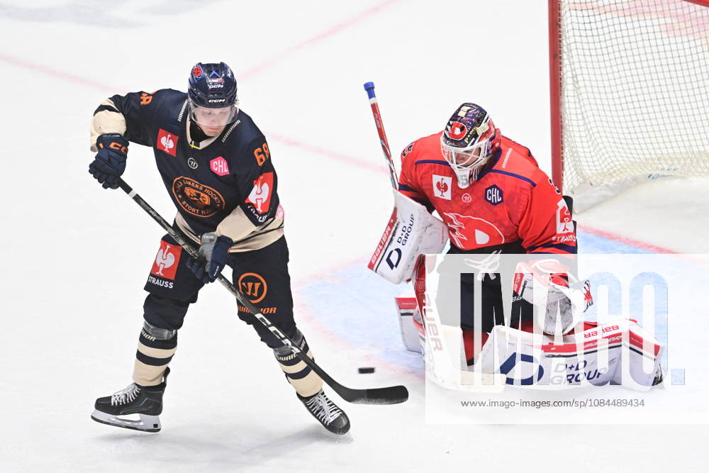 Ice hockey, Eishockey Champions League match: HC Dynamo Pardubice vs Vaxjo Lakers Hockey Club in Pardubice, Czech Republic, October 13, 2026. From left Eddie Levin of Vaxjo, Roman Will, goalie of Pardubice. (CTKxPhoto JosefxVostarek) CTKPhotoP2026101307456 CTKPhotoP2026101307456