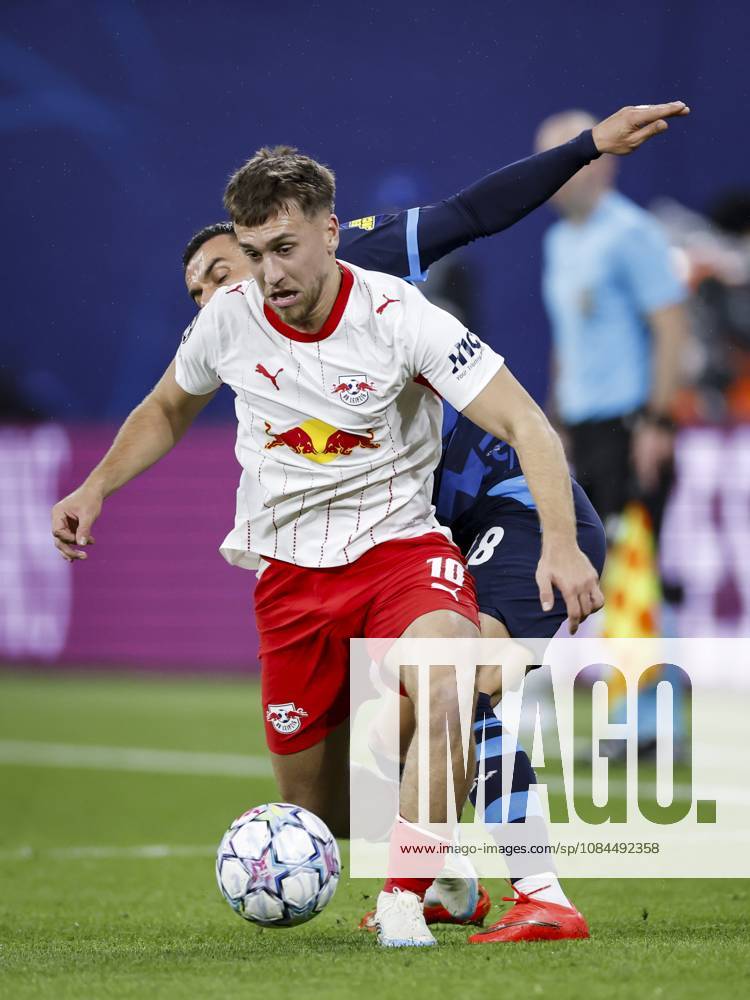 LEIPZIG - (lr) Brajan Gruda of RB Leipzig and Filip Kostic of PSV Eindhoven during the UEFA Champions League match between RB Leipzig and PSV Eindhoven at the RB Arena on 13 October 2026 in Leipzig, Germany. MAURICE VAN STEEN ANP ANPxSportx IVx 572346161 originalFilename: 572346161