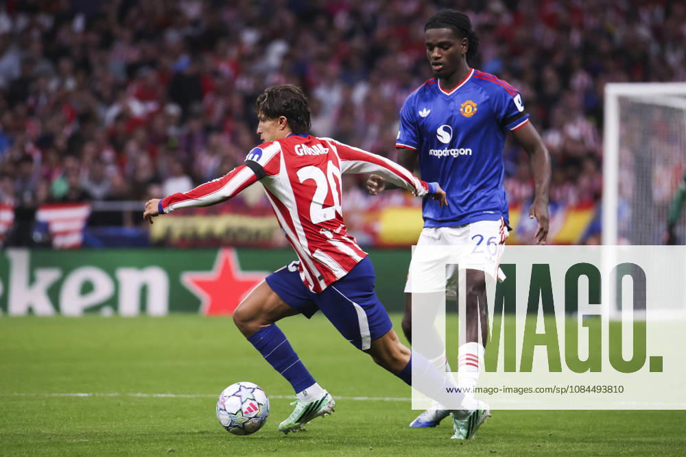 Atletico de Madrid v Manchester United, ManU - UEFA Champions League 2026 27 October 13, 2026, Riyadh Air Metropolitano Stadium, Madrid, Spain: Giuliano Simeone of Atletico de Madrid is defended by Ayden Heaven during UEFA Champions League 2026 27 football match between Atletico de Madrid and Manchester United at Riyadh Air Metropolitano Stadium on October 13, 2026, in Madrid, Spain. Madrid Riyadh Air Metropolitano Stadium Madrid Spain