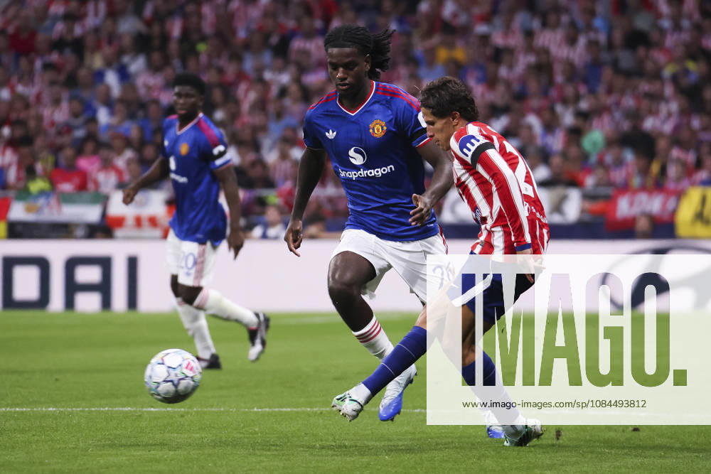 Atletico de Madrid v Manchester United, ManU - UEFA Champions League 2026 27 October 13, 2026, Riyadh Air Metropolitano Stadium, Madrid, Spain: Giuliano Simeone of Atletico de Madrid is defended by Ayden Heaven during UEFA Champions League 2026 27 football match between Atletico de Madrid and Manchester United at Riyadh Air Metropolitano Stadium on October 13, 2026, in Madrid, Spain. Madrid Riyadh Air Metropolitano Stadium Madrid Spain