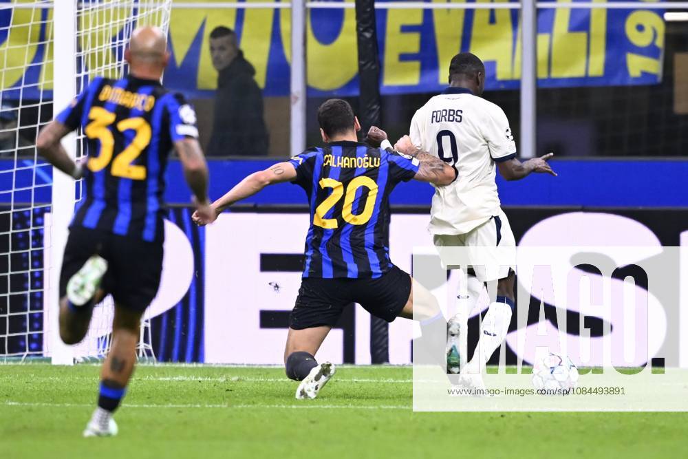 Inter Milan v Club Brugge - UEFA Champions League MILAN, ITALY - OCTOBER 13 : Calhanoglu Hakan midfielder of Inter Milan making a fault on Forbs Carlos forward of Club Brugge during the UEFA Champions League 2026 27 League Phase matchday 2 match between Inter Milan and Club Brugge on October 13, 2026 in Milan, Italy, 13 10 2026 Milan Italy