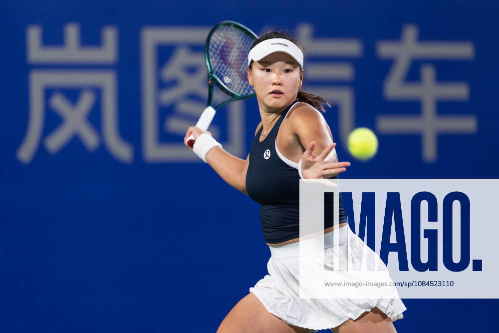 Hanyu Guo of China plays against Katie Volynets of USA ( not in view) during the Wuhan Open final match at the Optics Valley International Tennis Center. Hanyu Guo defeated Katie Volynets with a score of 6-4, 4-6, 7-6. Wuhan China - ZUMAs197 20261014_aaa_s197_098