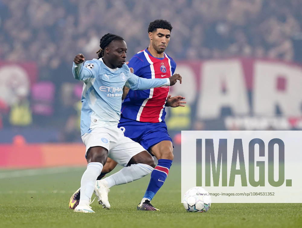 Manchester, England, 14th October 2026. Antoine Semenyo of Manchester City held up by Achraf Hakimi of Paris Saint-Germain during the Manchester City vs Paris Saint Germain UEFA Champions League match at the Etihad Stadium, Manchester. Picture credit should read: Andrew Yates Sportimage . SPI_021_AY_Man_City_PSG SPI-5069-0021