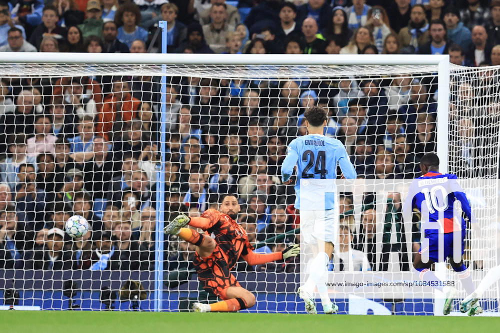 14th October 2026; Etihad Stadium, Manchester, England; UEFA Champions League Football, Manchester City versus Paris Saint Germain; Ousmane Dembele of Paris Saint Germain beats Manchester City goalkeeper Gianluigi Donnarumma to score for 0-2 after 15 minutes DavidxBlunsden