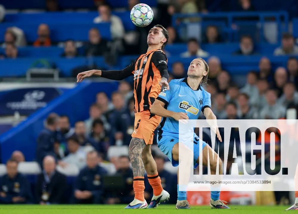 Lovro Majer of AEK Athens in action against Marlon Gomes of Shakhtar Donetsk Shakhtar Donetsk v AEK, UEFA Champions League, Football, Stamford Bridge, London, UK - 14 Oct 2026London Stamford Bridge United Kingdom