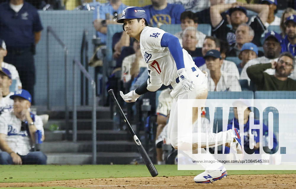 Los Angeles Dodgers designated hitter Shohei Ohtani (17) heads to first base after hitting a single against the Milwaukee Brewers in the bottom of the eighth inning in the MLB, Baseball Herren, USA National League Championship Series playoffs at Dodger Stadium in Los Angeles, California, on Wednesday, October 14, 2026. LAP20261014741 CAROLINExBREHMAN