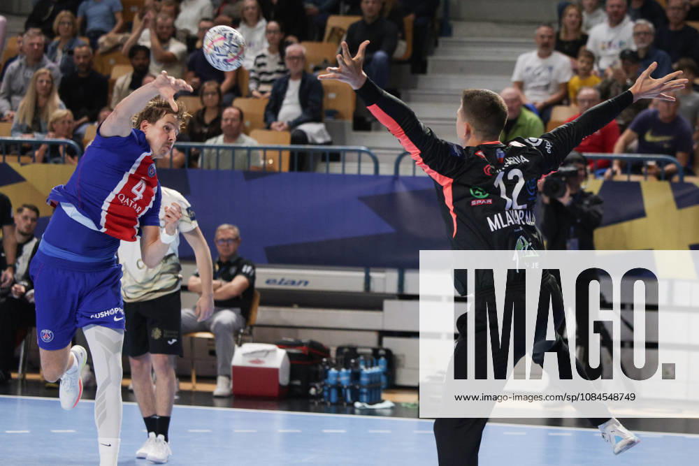 (261015) -- CELJE, Oct. 15, 2026 -- Bjarki Mar Elisson (L) of Paris Saint-Germain shoots the ball during the European Handball Federation (EHF) Champions League match between RK Celje Pivovarna Lasko and Paris Saint-Germain at Zlatorog Sports Hall in Celje, Slovenia, Oct.14, 2026. (Photo by Xinhua) (SP)SLOVENIA-CELJE-HANDBALL-EHF CHAMPIONS LEAGUE-RK CELJE PIVOVARNA LASKO VS PARIS SAINT-GERMAIN ZeljkoxStevanic