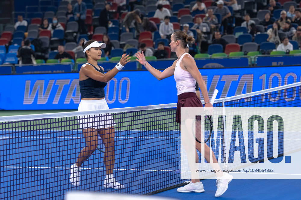 (261015) -- WUHAN, Oct. 15, 2026 -- Guo Hanyu (L) greets Elina Svitolina after the women s sinlges round of 16 match between Guo Hanyu of China and Elina Svitolina of Ukraine at the 2026 Wuhan Open tennis tournament in Wuhan, capital of central China s Hubei Province, Oct. 15, 2026. ) (SP)CHINA-WUHAN-TENNIS-WUHAN OPEN-WOMEN S SINGLES(CN) XiaoxYijiu