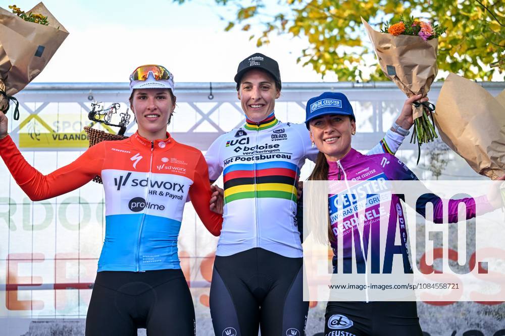 Luxembourg s Marie Schreiber; Netherlands Lucinda Brand and Netherlands Denise Betsema celebrate on the podium after the women elite race of the Kermiscross cyclocross cycling event, on Thursday 15 October 2026, in Ardooie. DAVIDxPINTENS x189892280x
