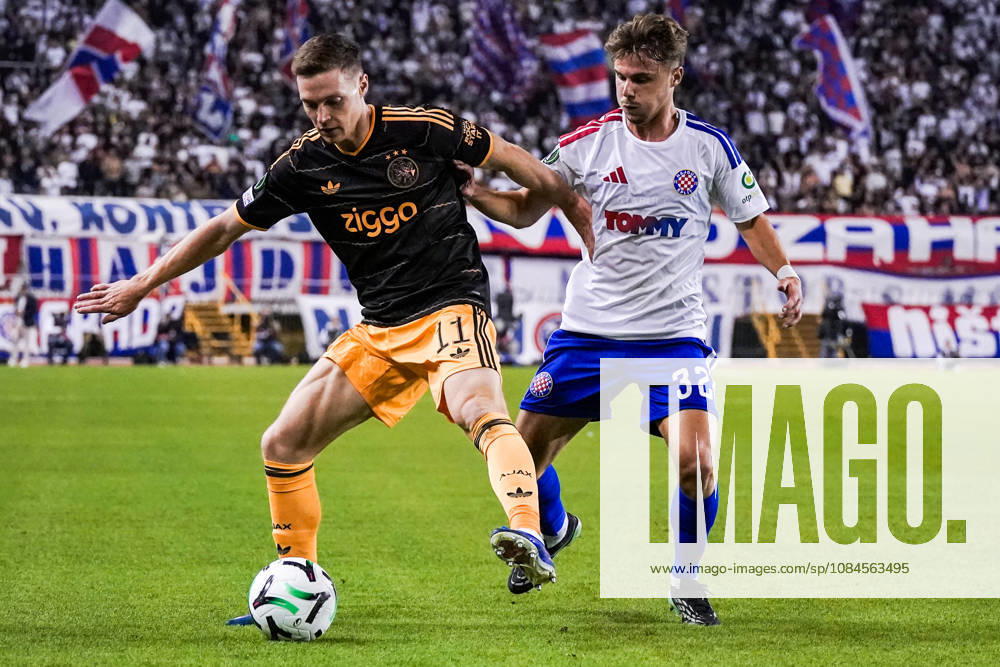 Fussball: Kroatien: UEFA Conference League 2026 2027 - 1. Runde, 15.10.2026 - HNK Hajduk Split vs. AFC Ajax Amsterdam - Stadion Poljud (Split, Kroatien); Viktor Tsygankov (AFC Ajax), Simun Hrgovic (Hajduk Split)