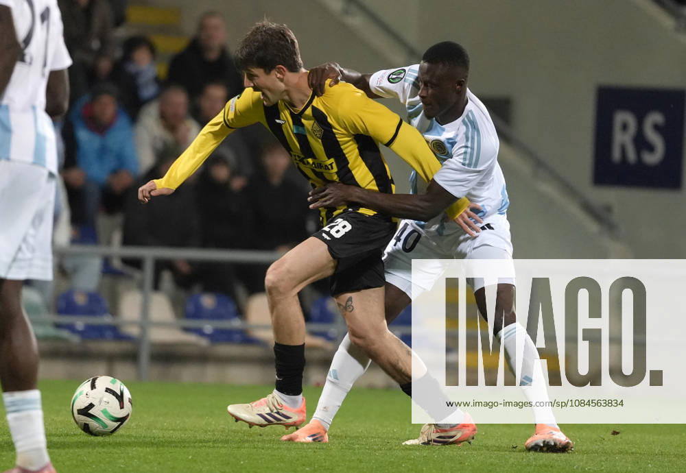 Ahmed Ankrah of Riga FC and Marc Gual of Kairat compete for the ball during a UEFA Conference League soccer match between Latvias Riga FC and Kazakhstans Kairat Almaty at Skonto Stadium in Riga, Latvia, Thursday, Oct. 15, 2026. Riga Latvia