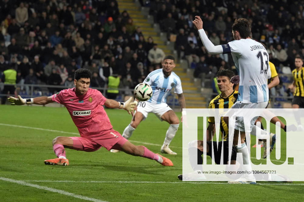 Temirlan Anarbekov of Kairat and Raivis Jurkovskis of Riga FC compete for the ball during a UEFA Conference League soccer match between Latvias Riga FC and Kazakhstans Kairat Almaty at Skonto Stadium in Riga, Latvia, Thursday, Oct. 15, 2026. Riga Latvia