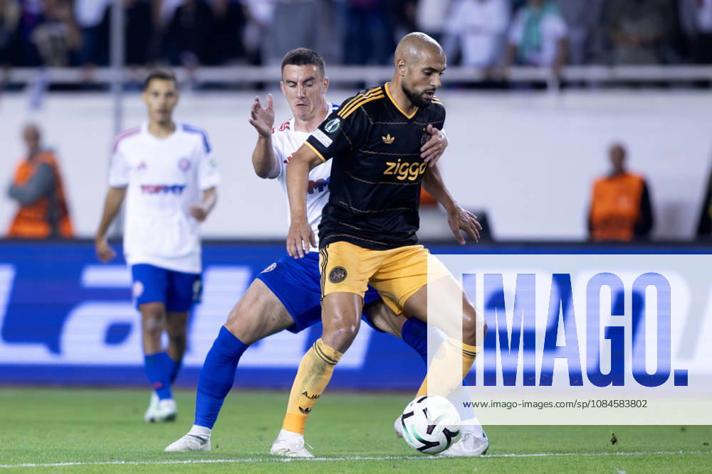 Sofyan Amrabat (AFC Ajax) 4 and Michele Sego (HNK Hajduk) in action during he UEFA Conference League match between HNK Hajduk Split (CRO) and AFC Ajax Amsterdam (NL) at Poljud Stadium. Split Croatia - ZUMAp210 20261015_zsp_p210_049