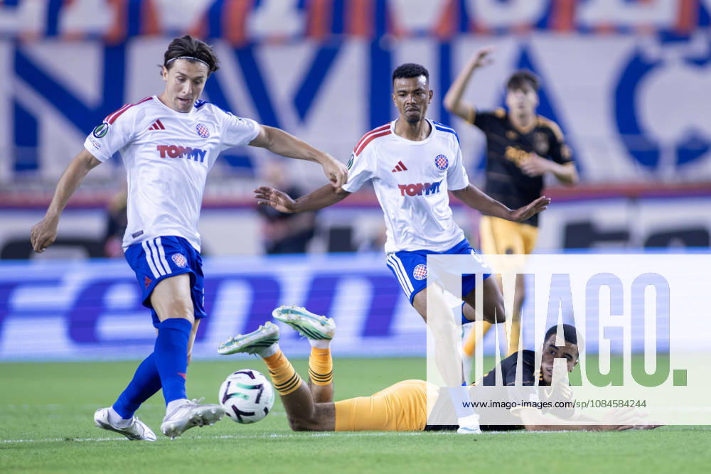 ALBERTO DEL MORAL (20) and DALISSON DE ALMEIDA (9) of HNK Hajduk Split in action as ABDELLAH OUAZANE (68) of AFC Ajax lies on the ground during the UEFA Conference League match between HNK Hajduk Split (CRO) and AFC Ajax Amsterdam (NED) at Poljud Stadium in Split. Split Croatia - ZUMAp210 20261015_zsp_p210_037