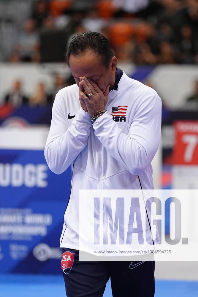 2026 World Cadet, Junior & U21, U 21 Karate Championships BIELSKO-BIALA, POLAND - OCTOBER 16: John Limcaco, Coach of the United States, reacts after the cadet male individual kata semi-final at the 2026 World Cadet, Junior & U21 Karate Championships at Hala Pod Debowcem on October 16, 2026 in Bielsko-Biala, Poland. Bielsko-Biala Hala Pod Debowcem Poland