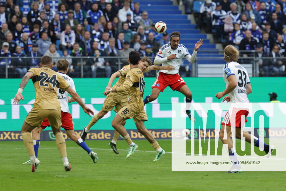 2026.10.17 Fussball 1. Bundesliga Hamburger Sportverein - VfB Stuttgart v.l. Yussuf Poulsen (Hamburger SV, 15) koepft den Ball (DFL DFB regulations prohibit any use of photographs as image sequences and or quasi-video.