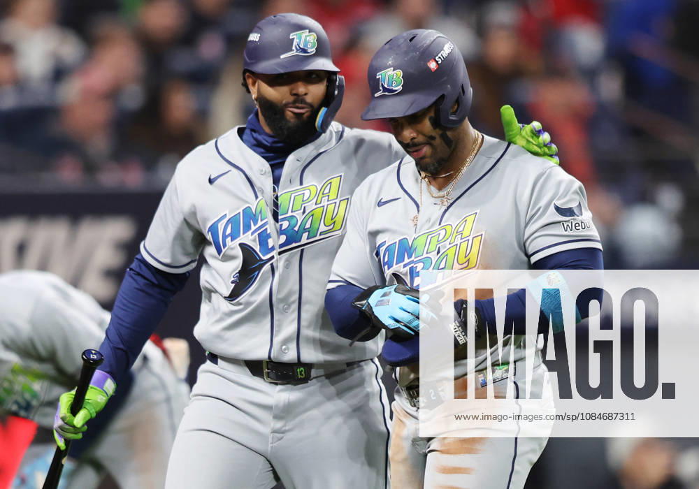 Tampa Bay Rays Yandy Diaz (2) is congratulated by Junior Caminero (13) after scoring on a single by Jonathan Aranda against the Cleveland Guardians in the third inning during game four of the MLB, Baseball Herren, USA American League Championship Series at Progressive Field in Cleveland, Ohio, on Saturday, October 17, 2026. CLE20261017710 AARONxJOSEFCZYK