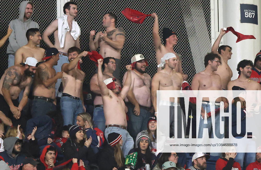 Shirtless Cleveland Guardians fans cheer for their team as they play the Tampa Bay Rays in game four of the MLB, Baseball Herren, USA American League Championship Series at Progressive Field in Cleveland, Ohio, on Saturday, October 17, 2026. CLE20261017738 AARONxJOSEFCZYK