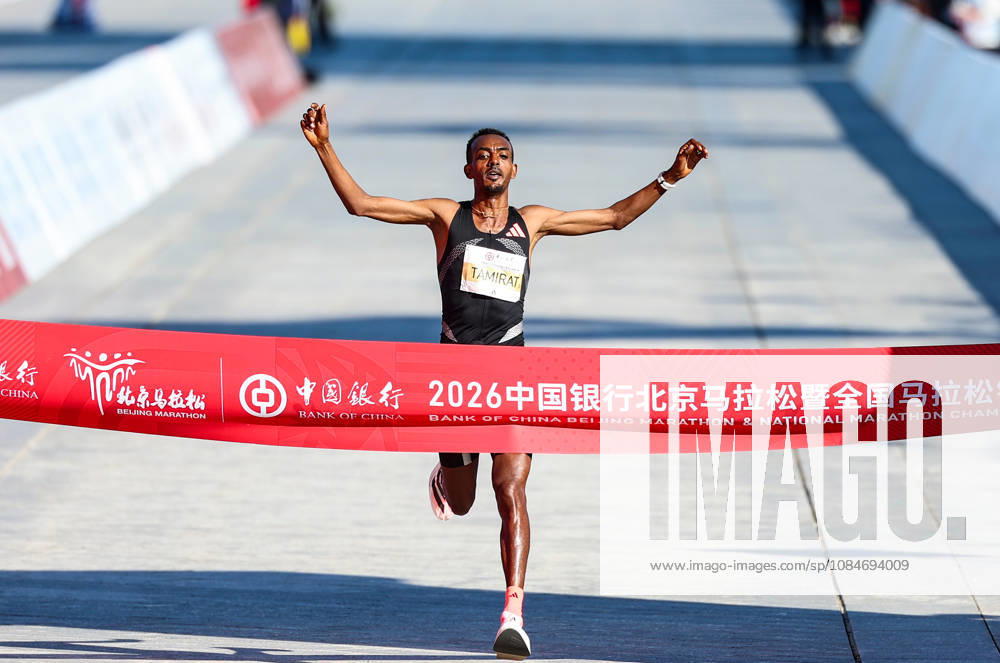 (261018) -- BEIJING, Oct. 18, 2026 -- Tamirat Tola of Ethiopia crosses the finish line to win the first place of the men s marathon event during the 2026 Beijing Marathon & National Marathon Championships in Beijing, capital of China, Oct. 18, 2026. ) (SP)CHINA-BEIJING-2026 BEIJING MARATHON(CN) LuoxYuan