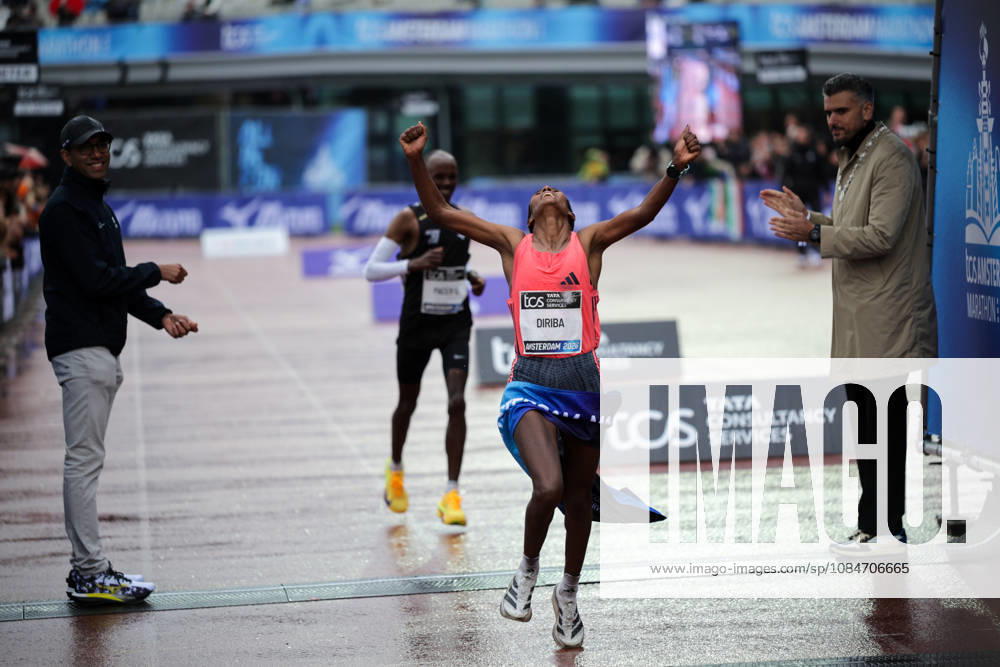 18th October 2026; Amsterdam, Netherlands; TCS Amsterdam Marathon; Buze Diriba of Ethiopia crosses the finish line to win the female elite race in a course record time of 2:16:12, the fastest women s marathon ever run in the Netherlands AnthonyxBenoit