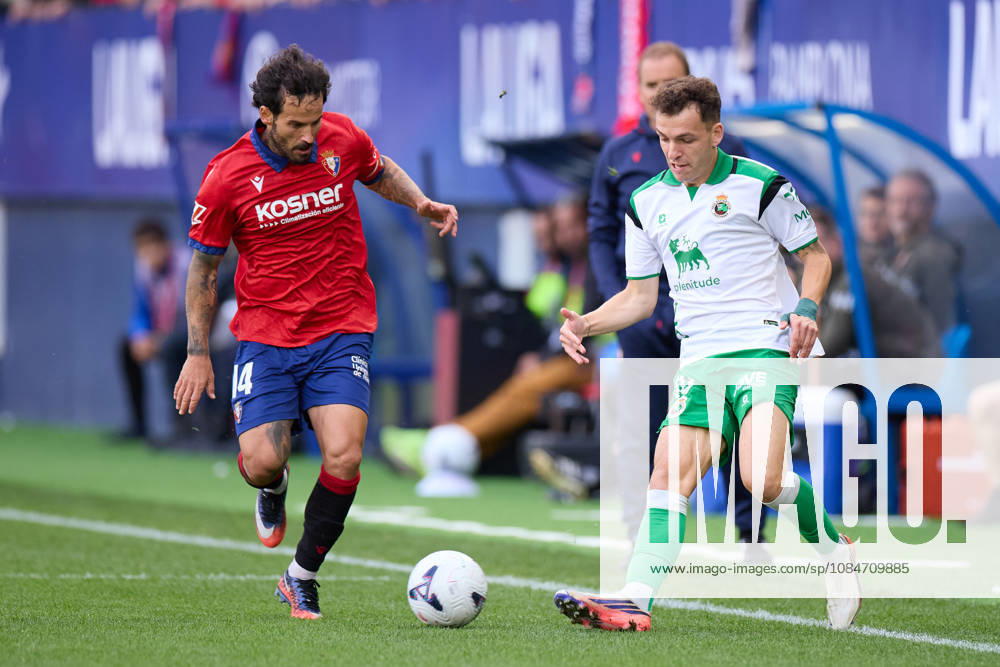 Ruben Garcia of CA Osasuna competes for the ball with Inigo Vicente of Real Racing Club de Santander during the LaLiga EA Sports match between CA Osasuna and Real Racing Club de Santander at El Sadar on October 18, 2026, in Pamplona, Spain. CA Osasuna V Racing De Santander - LaLiga EA Sports - ZUMAa181 20261018_zaa_a181_105