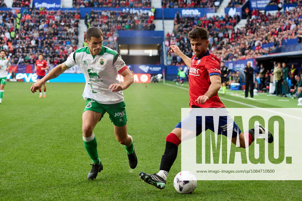 LaLiga EASports 2026 27 CA Osasuna v Racing de Santander Iker Munoz (8. OSA) (R) crosses the ball under pressure from Alvaro Mantilla (2. RAC) (L) during the football match of LaLiga EA Sports between CA Osasuna and Racing de Santander played at El Sadar stadium in Pamplona (Spain) on Oct 18 2026. Credit: Inigo Alzugaray Agencia LOF Pamplona LaLiga EASports 2026 27 CA Osasuna v Racing de Santander