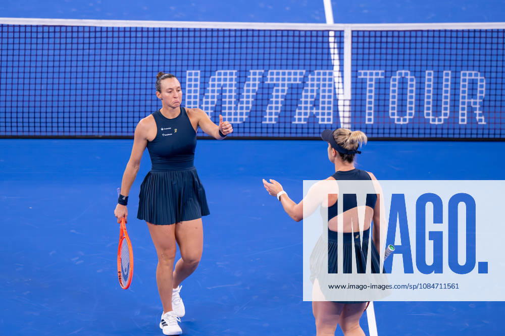 (261018) -- WUHAN, Oct. 18, 2026 -- Gabriela Dabrowski Luisa Stefani (L) celebrate during the women s doubles final match between Gabriela Dabrowski of Canada Luisa Stefani of Brazil and Storm Hunter of Australia Katerina Siniakova of the Czech Republic at the 2026 Wuhan Open tennis tournament in Wuhan, capital of central China s Hubei Province, Oct. 18, 2026. ) (SP)CHINA-WUHAN-TENNIS-WUHAN OPEN-WOMEN S DOUBLES (CN) DuxZixuan
