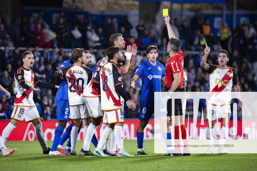 Getafe CF v Rayo Vallecano - La Liga EA Sports 2026 27 October 19, 2026, Estadio El Coliseum, Getafe, Madrid, Spain: Referee shows the yellow card to Djene Dakonam of Getafe during La Liga EA Sports match between Getafe and Rayo Vallecano at Estadio El Coliseum on October 19, 2026 in Madrid, Spain. Getafe Estadio Coliseum Madrid Spain