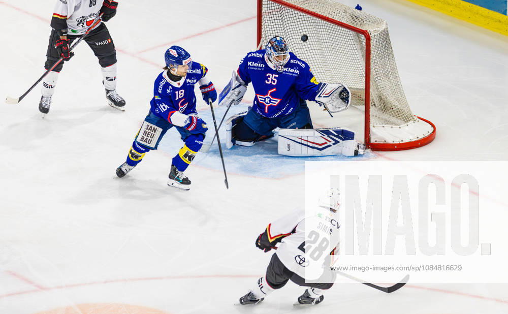 Ice hockey, Eishockey National League Regular Season - EHC Kloten vs Lausan Kloten, Switzerland, 20th Oct 2026: 5th minute 28 Axel Simic (Lausanne) scores on the power play to make it 0:1. Defender 18 Dario Sidler (Kloten) and goalkeeper 35 Davide Fadani (Kloten) have no chance.