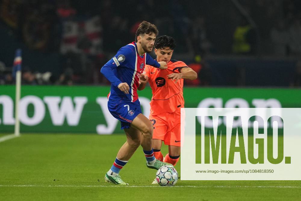 Khvicha Kvaratskhelia of PSG and Xavi Espart of Barcelona Paris Saint-Germain v Barcelona, UEFA Champions League, Football, Parc des Princes, Paris, France - 20 Oct 2026Paris Parc des Princes France