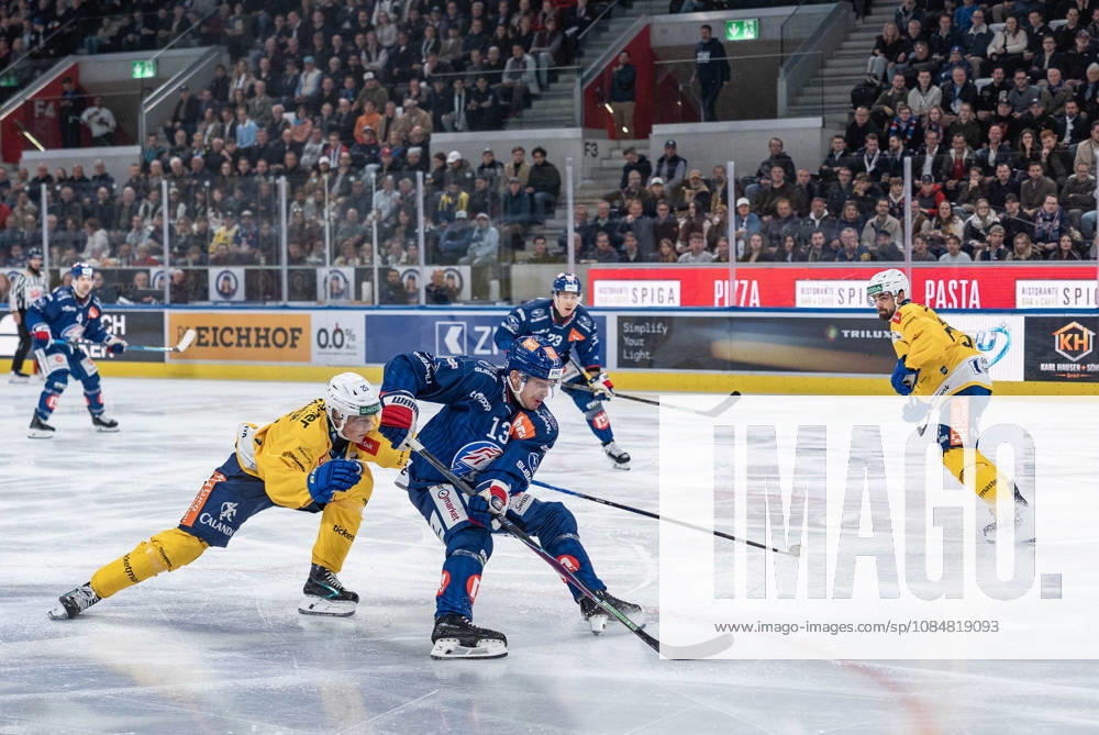 Zürich, Swiss Life Arena, National League: ZSC Lions - HC Davos, 25 Beni Waidacher (Davos), 13 Justin Sigrist (ZSC) Zürich Swiss Life Arena Zürich Switzerland