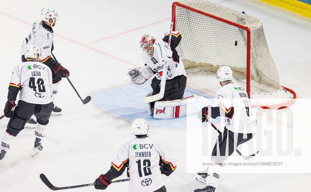 Ice hockey, Eishockey National League Regular Season - EHC Kloten vs Lausan Kloten, Switzerland, 20th Oct 2026: 36th minute: 81 Inaki Baragano, 42 Curtis Lazar, 12 Yannick Zehnder and 91 Fabian Heldner (all Lausanne) watch as the puck finds its way behind goaltender 33 Kevin Pasche (Lausanne) and into the net. Score 1:2.